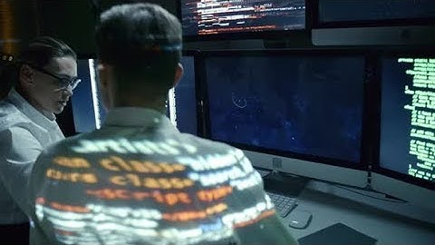 Computer Programmers Talking in Office at Night | Stock Footage - Videohive