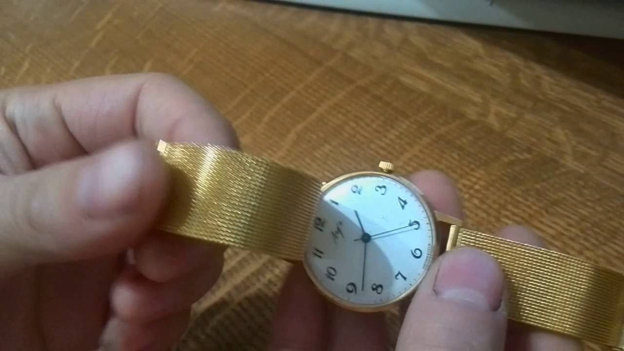 Как отрегулировать браслет часов. Отрегулировать ремешок на часах. Регулировка застежки на часах. Браслет 18 мм для часов металлический петля. Ремень для часов металлический позолоченный.