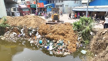 Project Building filling flood, Skills Trucks & dozer Komatsu D31P Pushing
