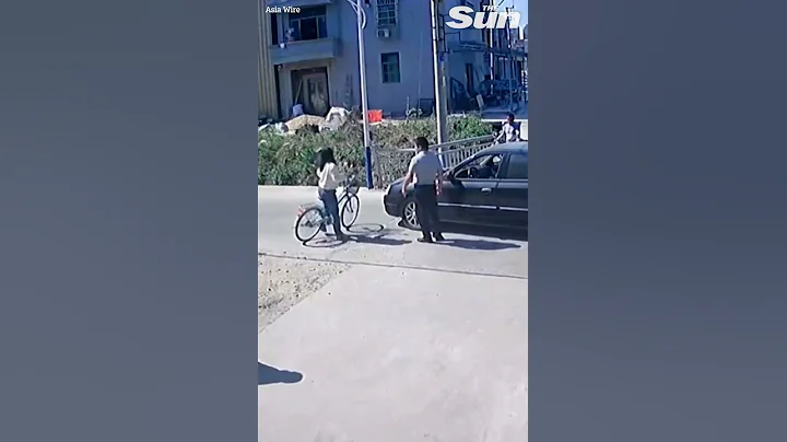 Woman cyclist hit by car before getting up unscathed #Shorts