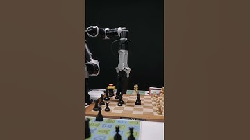 Artificial intelligence robot. A robot playing chess.