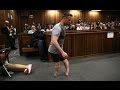 Oscar pistorius removes prosthetic legs in court