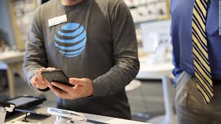 AT&T closes stores and slashes staff
