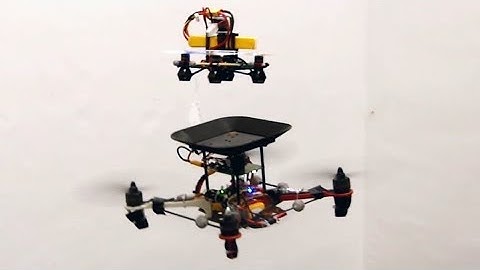 Flying batteries: In-flight battery switching to increase multirotor flight time