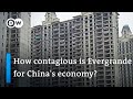 Housing crisis in China: Evergrande shares tank after re-entering trade | DW News