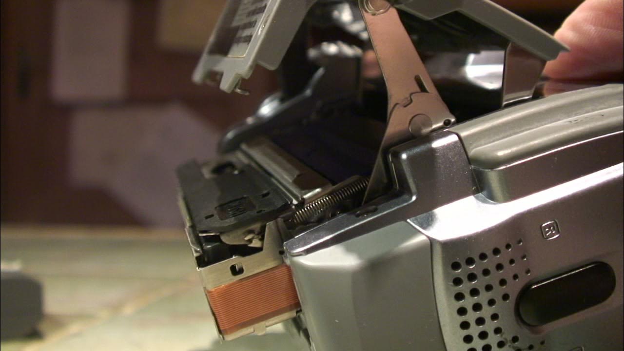Ejecting a tape from a Canon MV series camcorder. YouTube