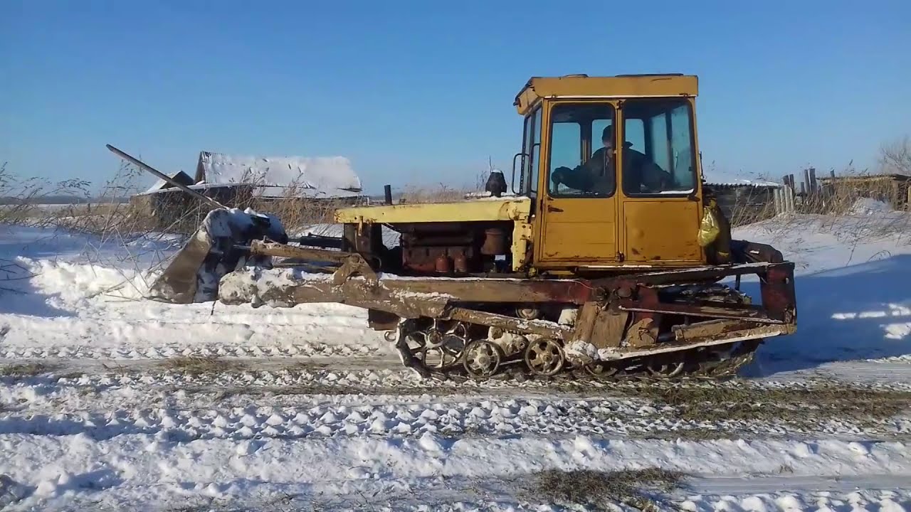 Д т зимнее. МТЗ 75. Гусеничный МТЗ зимой. ДТ зимой. ДТ-75 по снежной целине.