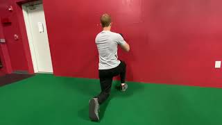 EricCressey.com: Half Kneeling Wall Press 1-arm Kettlebell Thoracic Rotations