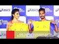 Gopi  t  pooja hegde unveil official race day tee for tata mumbai marathon