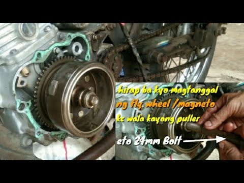 Video: Paano mo alisin ang isang mercury flywheel?