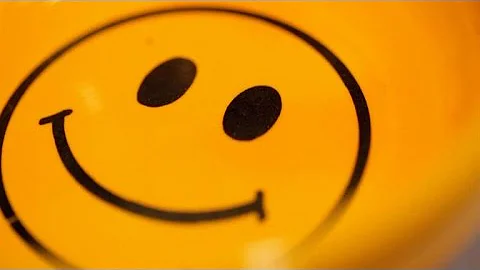Who owns the copyright to the smiley face?