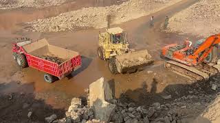 CAT MachineLoading Giant Boulders""Unstopp CAT Power: Huge RockLoading 