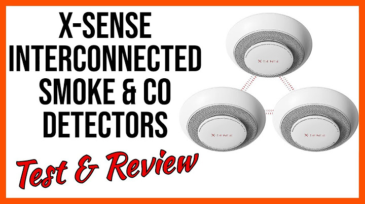 Interconnected wireless smoke and carbon monoxide detectors