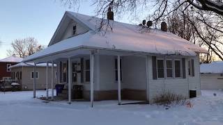A Real Estate Investor Walks Through a House Purchased on Auction.com