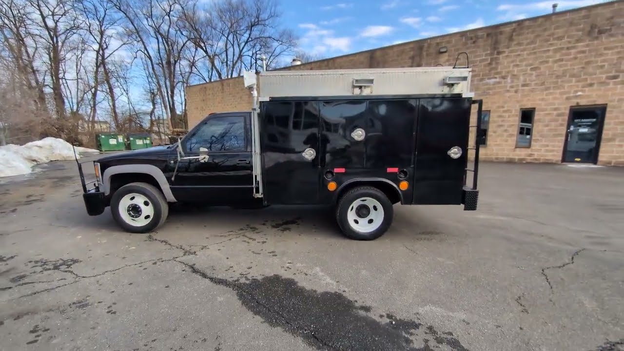 1998 Chevrolet C3500 utility body truck with dual rear wheels and 7.4L 454 c.i. V8 engine. 