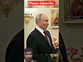 Vladimir Putin Presents Flowers to the Orthodox Patriarch