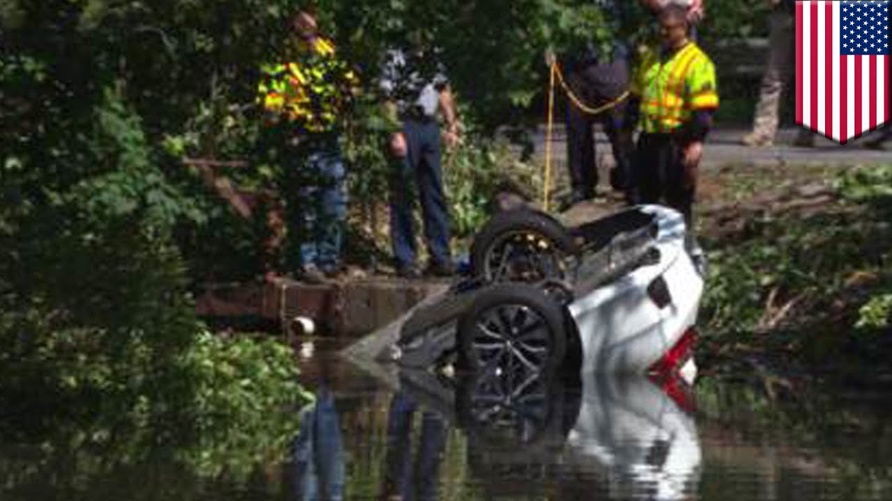 Framingham car crash woman survives after car submerged in pond