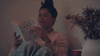Stock Video Footage - Woman Reading Self Help Book