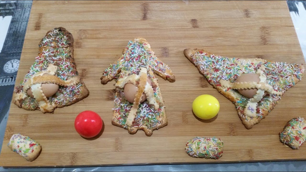 CUDDURA CULL'OVA , PUPI CON L'UOVO ( DOLCE PASQUALE SICILIANO )