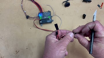 Modifying a standard switch for use as a Spektrum Smart Switch.
