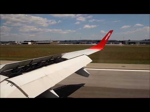 Take-off and landing of a Helvetic Airways Embraer 190