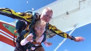 Dad skydiving with 5 years old daughter