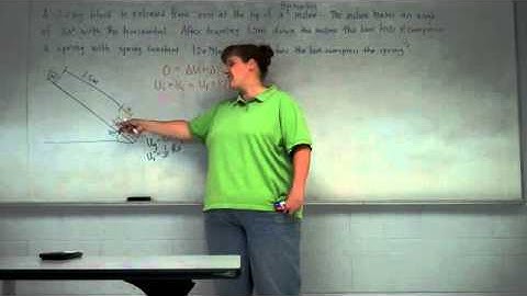 Energy Example -- motion on an incline with a spring