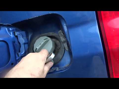 Замена тросика открывания лючка бензобака на Mazda Demio
