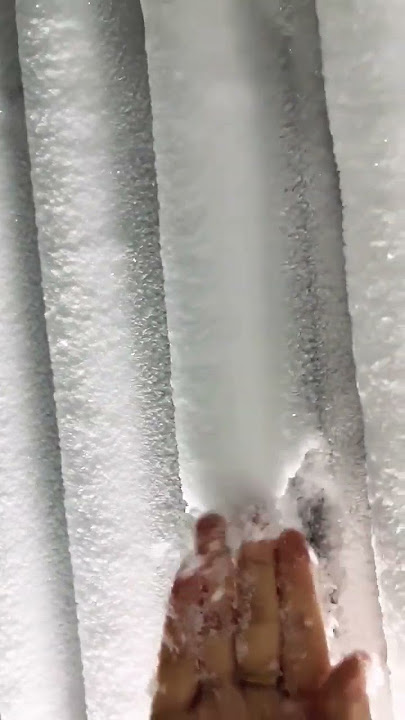 FREEZER FROST SCRAPING. ICE EATING