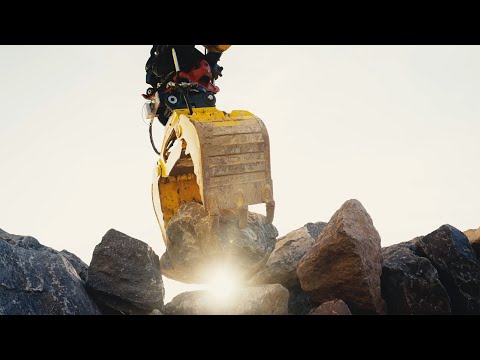 Autonomous excavator constructs a six-metre-high dry stone wall