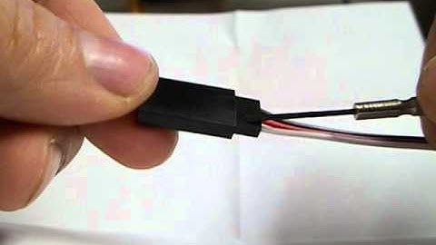 How to remove the hood on a male R/C servo connector extension