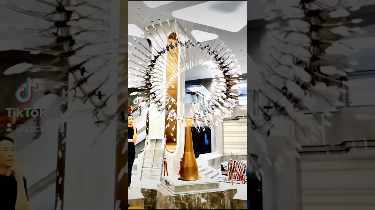 Kinetic energy mechanical lighting sculpture art installation