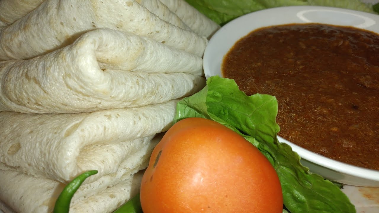 أشهر اكلة سودانية تقليدية /ملاح التقلية مع القراصة السودانية😋 - YouTube