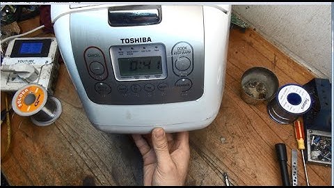 Nồi Toshiba sống cơm.Anh khách tự sửa và bị như thế này đây!