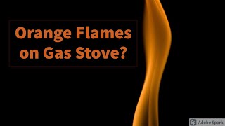 Orange flames on gas stove.