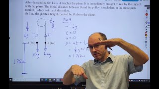 Mechanics M1: two particles attached to a pulley via a light inextensible string, moving vertically
