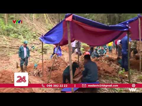 Video Khai quật lại vị trí an táng 12 liệt sỹ thanh niên... - youtube