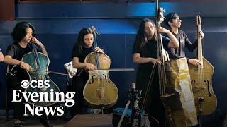 Creative musicians turn trash to instruments and a landfill to theater