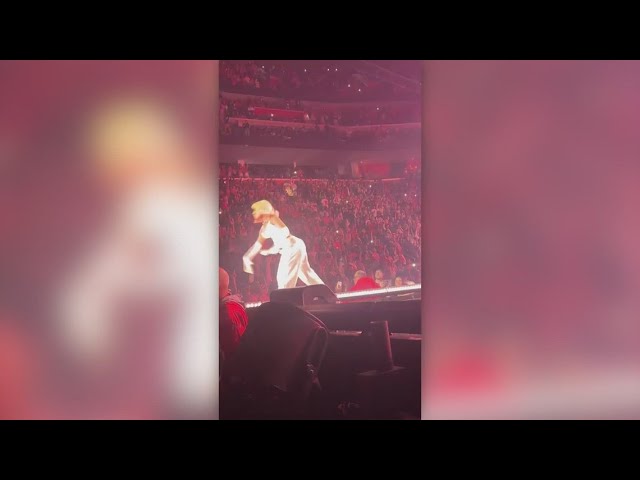 Nicki Minaj throws object back at crowd after swatting it away