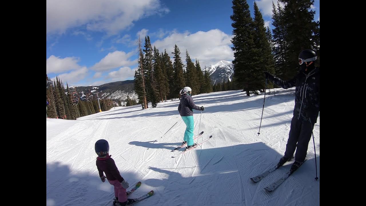 Skiing in copper mountain Colorado riding the lumberjack lift to