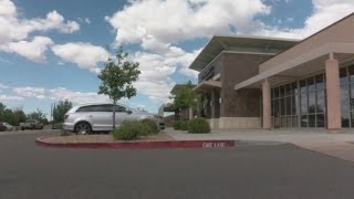 Woman hit with gun at Albuquerque shopping center