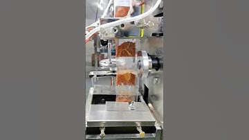 Automatic powder packaging machine