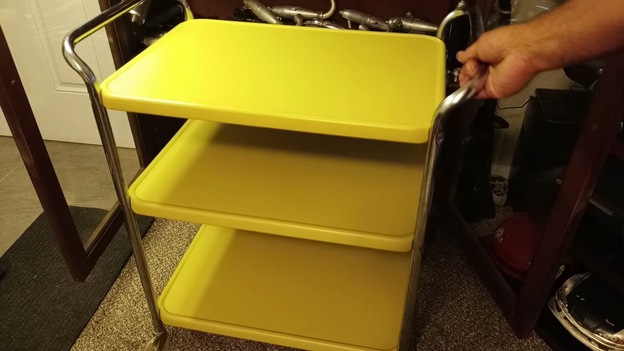 Classic vintage 50s 60s Cosco 3 tier metal rolling utility cart original drab yellow paint shelf