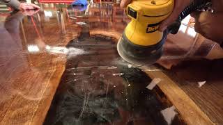 Busting my epoxy table out of the mold.  Looks AWSOME!!!