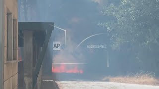 Nearly 5,000 firefighters continue battling wildfires in Portugal as the country requests EU aid