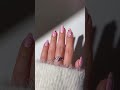 Soft milky pink tones with tiny heart accents and a glossy finish.#nails #nailart #nailtrends