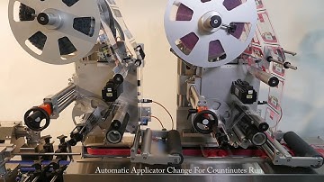 Reclosable Lids Labeling Machine by Tadbik Systems