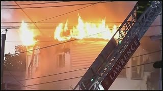 Lawrence, 6-alarm fire burns 2 buildings