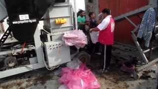 Bag filling machine for mushroom compost