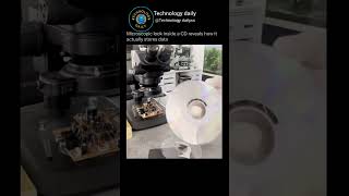 Microscopic look inside a CD reveals how it actually stores data #technology #shorts